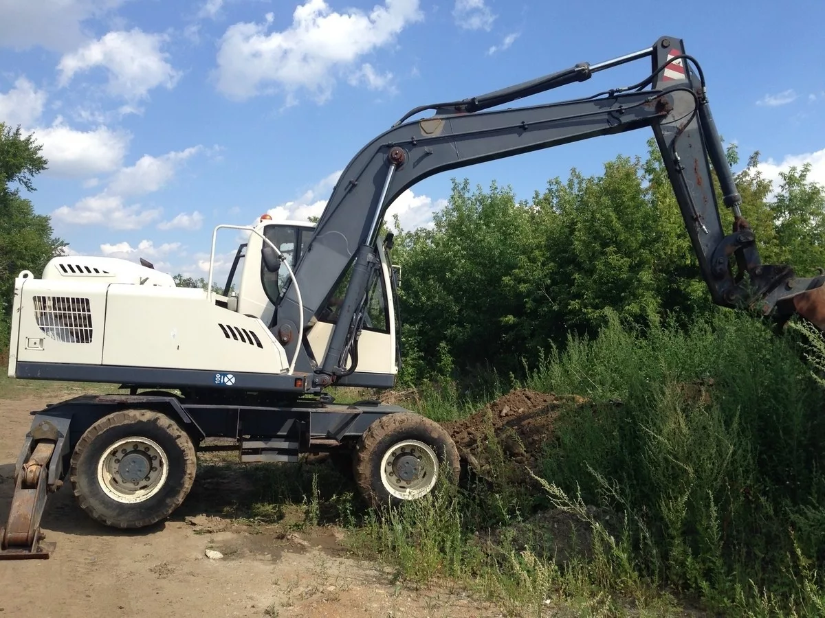 Колёсный экскаватор Terex Tvex 140W
